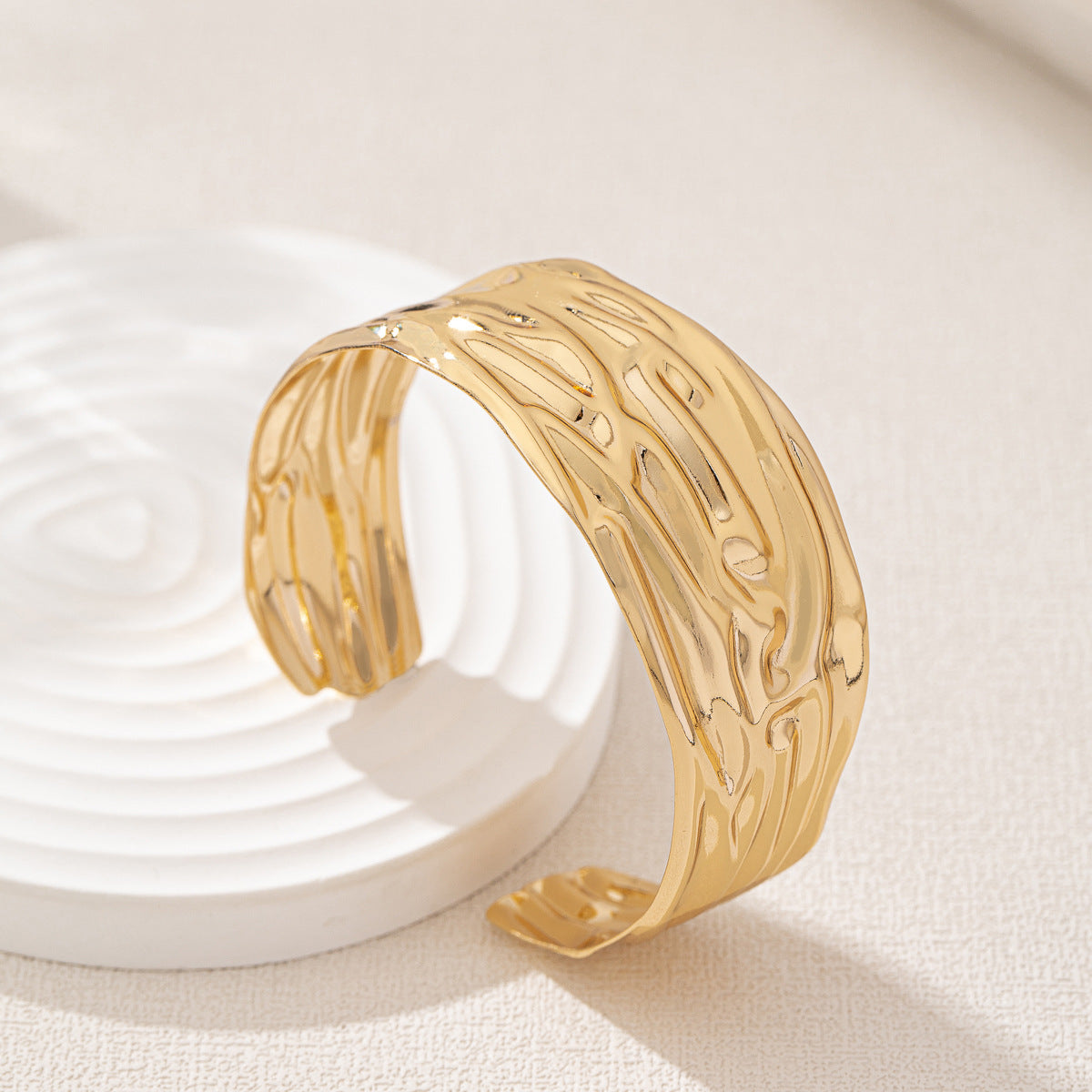 Wholesale wide hammered pleated golden bracelet